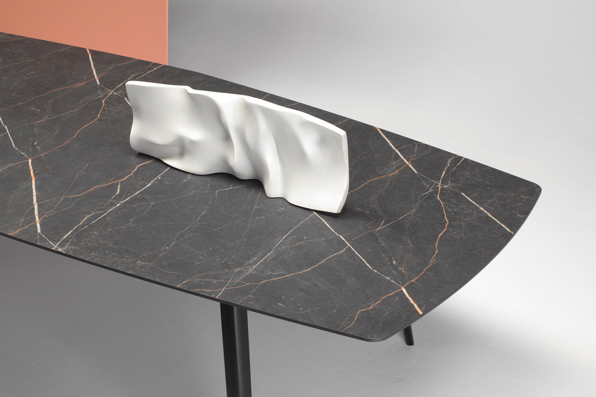Die-cast aluminum table with a hexagonal 118x51" compact laminate top Squid 2437