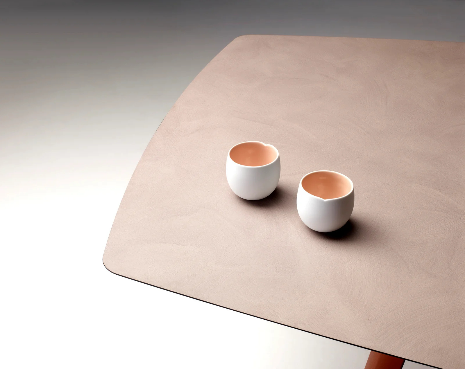 Die-cast aluminum table with a hexagonal 118x51" compact laminate top Squid 2437