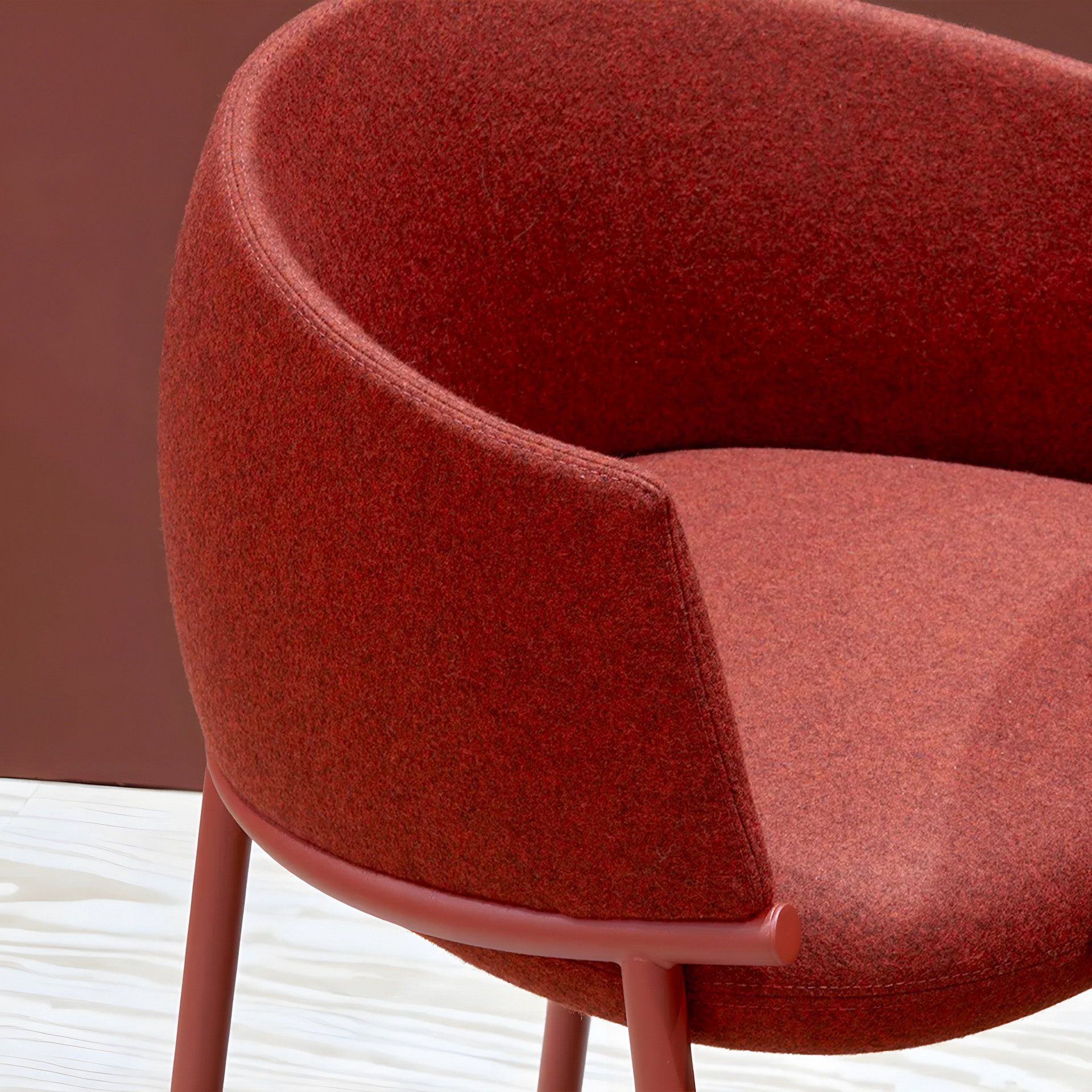 Upholstered metal armchair Koala