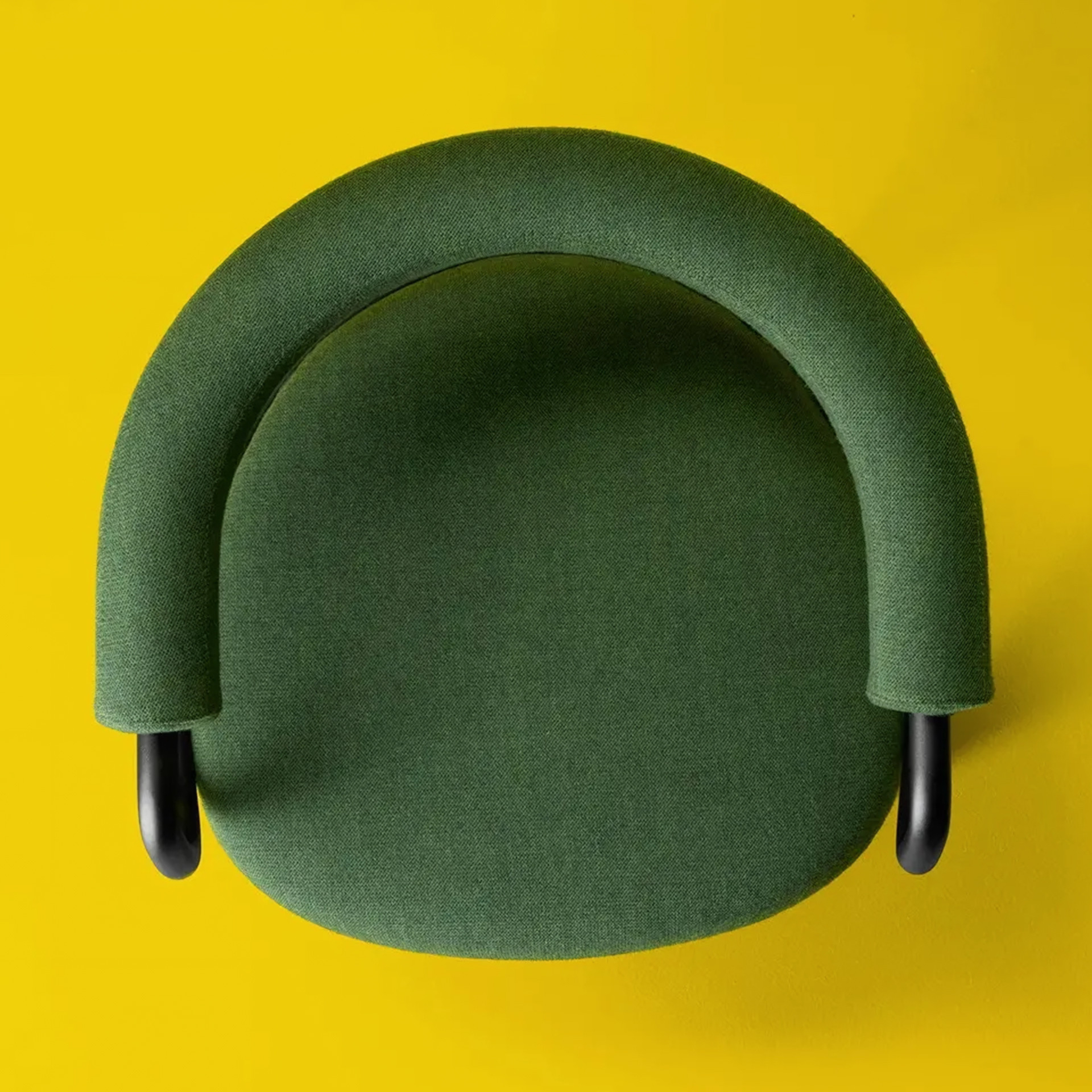 Upholstered metal armchair Koala O