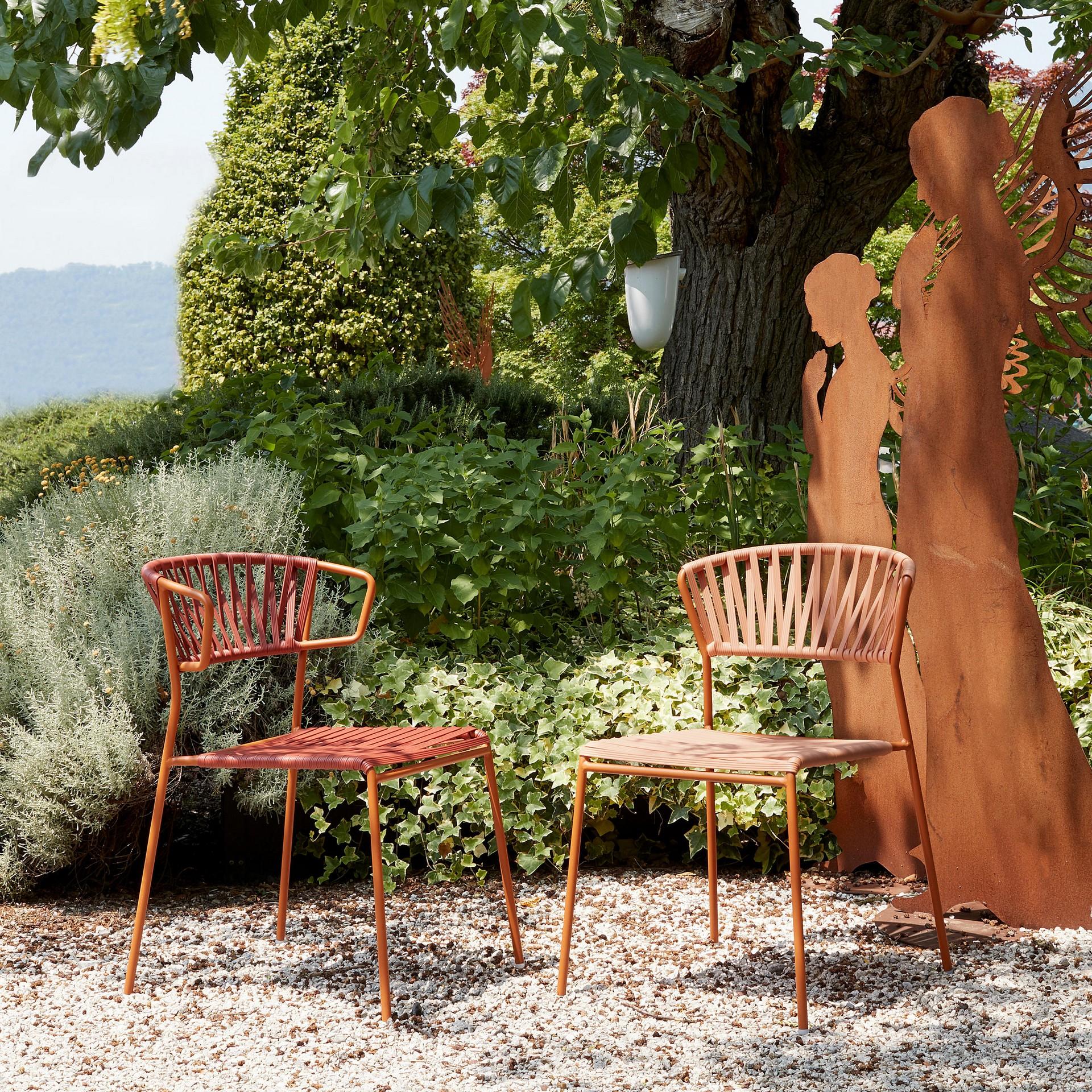 Stackable outdoor chair in steel and woven PVC wires A-2874 Lisa Club