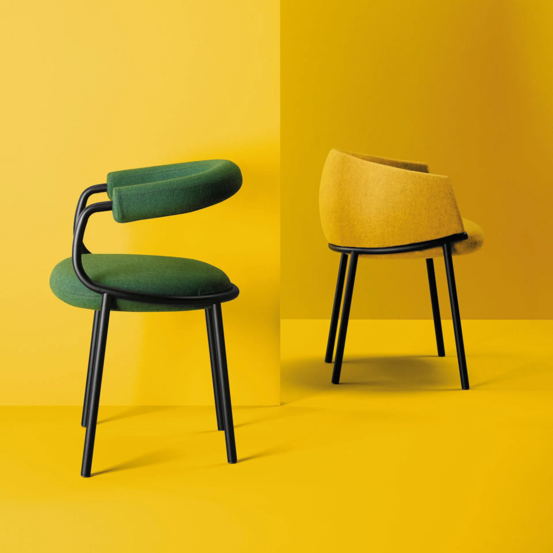 Upholstered metal armchair Koala O